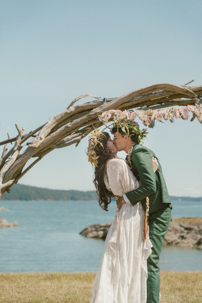 Couples first kiss taken at a Colorado wedding venue