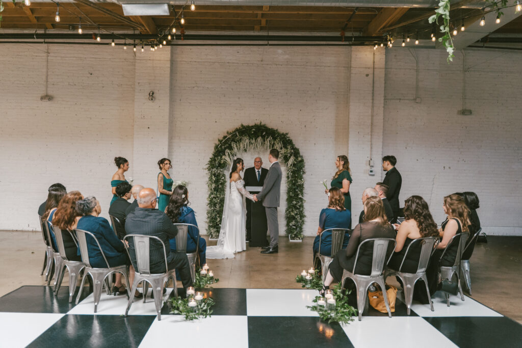 Couple stands at ceremony in their Colorado wedding venue