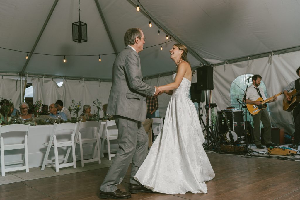 Bride dances with her father during wedding at Stone Mountain Lodge in Lyons Colorado